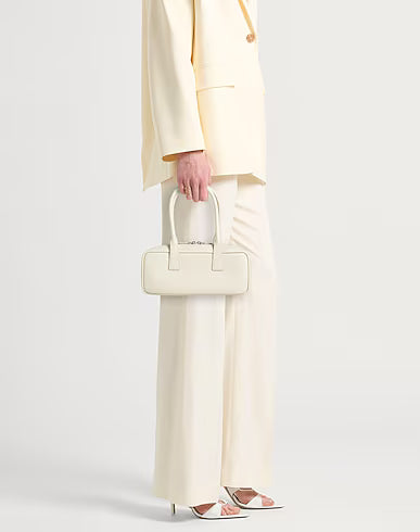 Structured baguette bag in grained leather